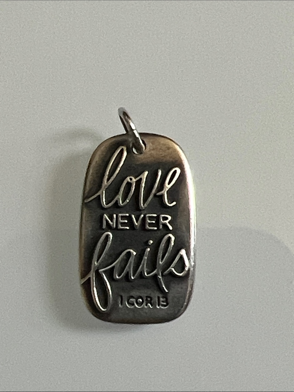 James Avery Retired Silver 'Love Never Fails' Inspirational Pendant